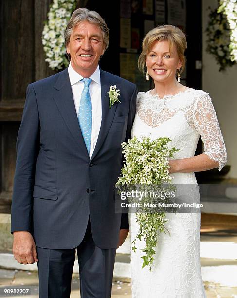 Nick Cook and Eimear Montgomerie leave St. Nicholas Church after their wedding on September 20, 2009 in Cranleigh, England.