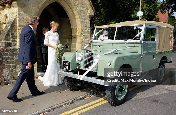Nick Cook and Eimear Montgomerie leave St. Nicholas Church in a canvas roofed Land Rover after their wedding on September 20, 2009 in Cranleigh,...