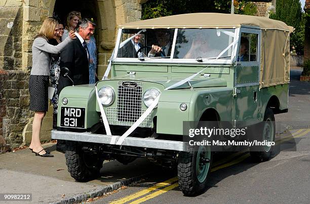 Nick Cook and Eimear Montgomerie leave St. Nicholas Church in a canvas roofed Land Rover after their wedding on September 20, 2009 in Cranleigh,...
