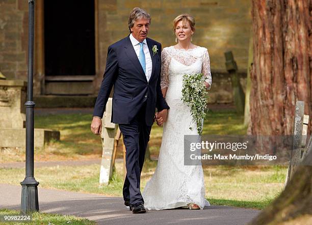 Nick Cook and Eimear Montgomerie leave St. Nicholas Church after their wedding on September 20, 2009 in Cranleigh, England.