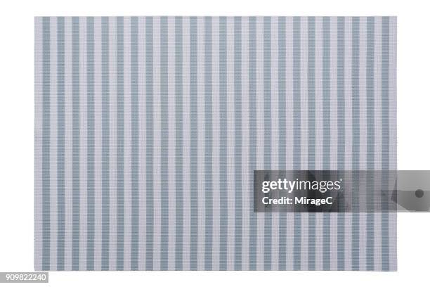 pastel blue stripy placemat on white - 敷物 マット ストックフォトと画像