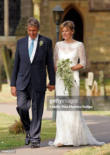 Nick Cook and Eimear Montgomerie leave St. Nicholas Church after their wedding on September 20, 2009 in Cranleigh, England.