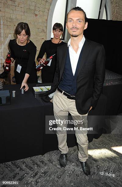 Matthew Williamson attends the Matthew Williamson show during London Fashion Week, at the MARTINI 'Stay Beautiful' lounge on September 20, 2009 in...