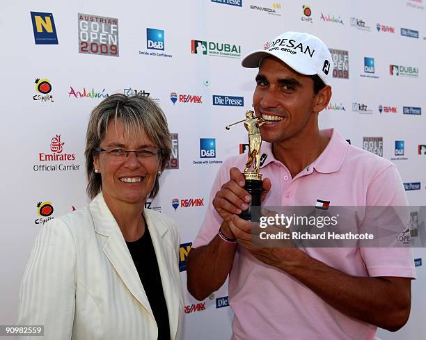 Rafael Cabrera-Bello of Spain is presented with the trophy by Petra Bohuslav, Minister for Sport in Lower Austria, after the fourth round of the...