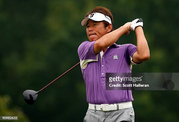 Joe Ozaki of Japan watches his tee shot on the second hole during the final round of the Greater Hickory Classic at the Rock Barn Golf & Spa on...