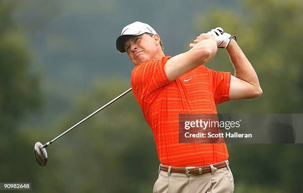 Bob Tway watches his tee shot on the second hole during the final round of the Greater Hickory Classic at the Rock Barn Golf & Spa on September 20,...