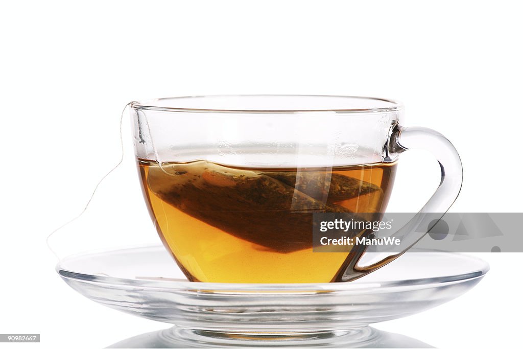 Clear tea cup with teabag inside