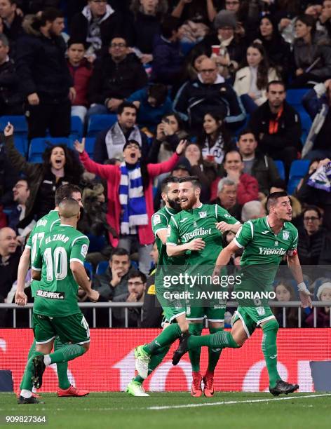 Leganes' Brazilian midfielder Gabriel Appelt celebrates a goal with teammates during the Spanish 'Copa del Rey' quarter-final second leg football...