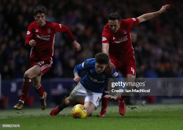 Josh Windass of Rangers vies with Andrew Considine of Aberdeen during the Ladbrokes Scottish Premiership match between Rangers and Aberdeen at Ibrox...