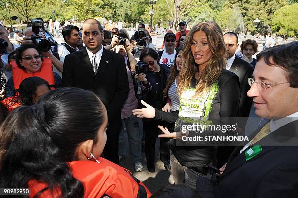 Brazil-born model Gisele Bündchen , who was designated Goodwill Ambassador for the United Nations Environment Programme , speaks with UNEP Executive...