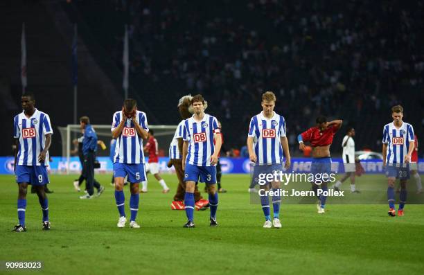 Players of Berlin look dejected after the Bundesliga match between Hertha BSC Berlin and SC Freiburg at Olympic Stadium on September 20, 2009 in...