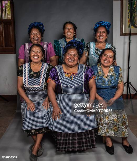 The Mendoza sisters Maria Luisa, Marcelina, Rosario and Adelina, Abigail and Rufina pose for a photograph at the Tlamanalli restaurant on February...