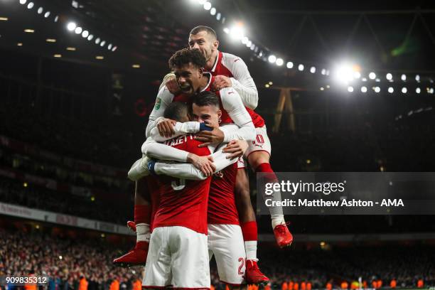 Granit Xhaka of Arsenal celebrates after scoring a goal to make it 2-1 during the Carabao Cup Semi-Final Second Leg match between Arsenal and Chelsea...