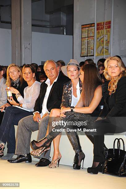 Sir Philip Green, Kate Moss and Chloe Green attend the Unique show during London Fashion Week, on September 20, 2009 in London, England.