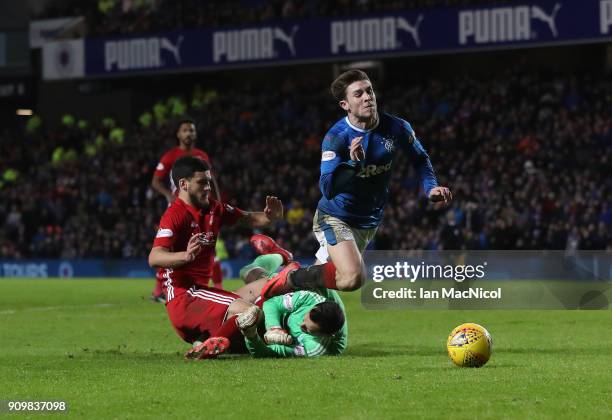 JJoe Lewis of Aberdeen brings down Josh Windass of Rangers during the Ladbrokes Scottish Premiership match between Rangers and Aberdeen at Ibrox...