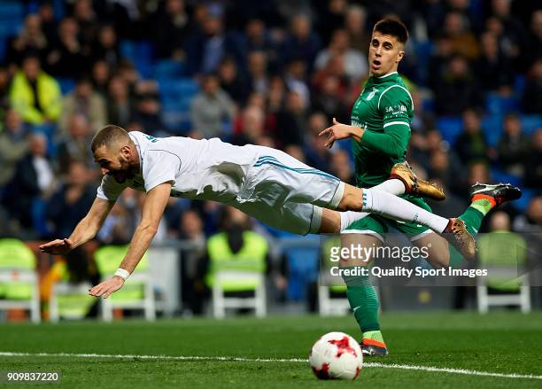 Karim Benzema of Real Madrid falls on the field during the Spanish Copa del Rey Quarter Final Second Leg match between Real Madrid and Leganes at...