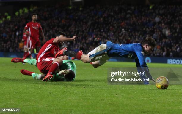 JJoe Lewis of Aberdeen brings down Josh Windass of Rangers during the Ladbrokes Scottish Premiership match between Rangers and Aberdeen at Ibrox...