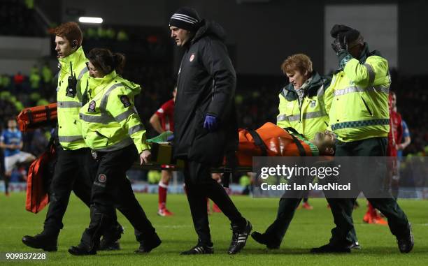 JJoe Lewis of Aberdeen is stretchered off after he brings down Josh Windass of Rangers during the Ladbrokes Scottish Premiership match between...