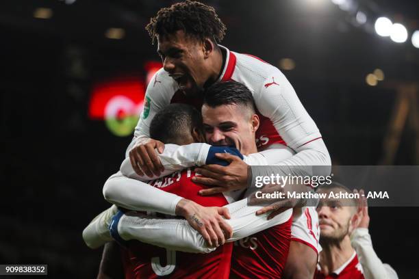 Granit Xhaka of Arsenal celebrates after scoring a goal to make it 2-1 during the Carabao Cup Semi-Final Second Leg match between Arsenal and Chelsea...