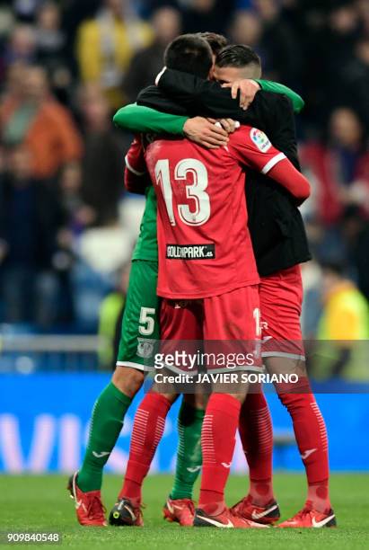 Leganes players celebrate their qualification for semifinals at the end of the Spanish 'Copa del Rey' quarter-final second leg football match between...