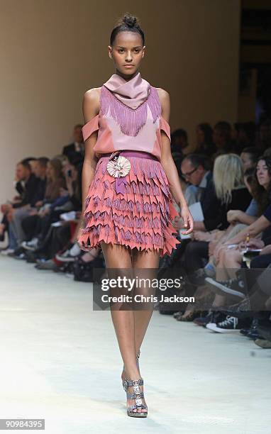 Model walks the runway in the Richard Nicoll Spring/Summer 2010 show at the Topshop Show Space during London Fashion Week on September 20, 2009 in...