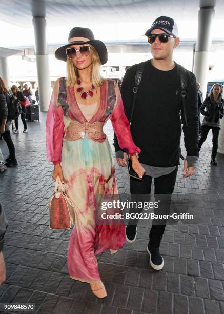 Paris Hilton and her fiance Chris Zylka seen on January 24, 2018 in Los Angeles, California.