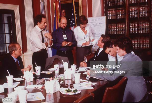 Moira Kelly, Dule Hill, Rob Lowe, Richard Schiff, Martin Sheen, John Spencer, Allison Janney, and Bradley Whitford in "The West Wing." Photo NBC