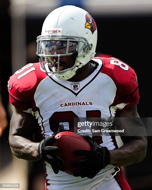 Anquan Boldin of the Arizona Cardinals runs for yardage during the game against the Jacksonville Jaguars at Jacksonville Municipal Stadium on...