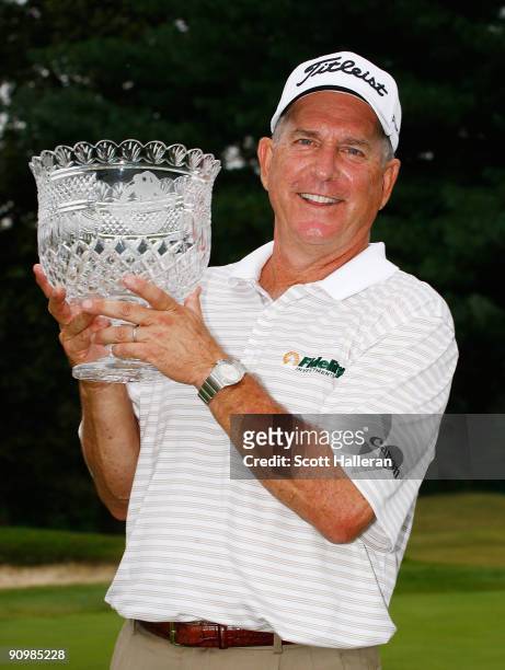 Jay Haas poses with the winner's trophy after his two-stroke victory at the Greater Hickory Classic at the Rock Barn Golf & Spa on September 20, 2009...