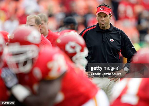 Head coach Todd Haley of the Kansas City Chiefs watches during warm-ups prior to the start of the game against the Oakland Raiders at Arrowhead...