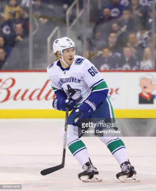 Markus Granlund of the Vancouver Canucks keeps an eye on the play during first period action against the Winnipeg Jets at the Bell MTS Place on...