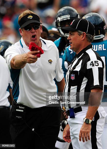 Head coach Jack Del Rio of the Jacksonville Jaguars speaks with a referee during the game against the Arizona Cardinals at Jacksonville Municipal...