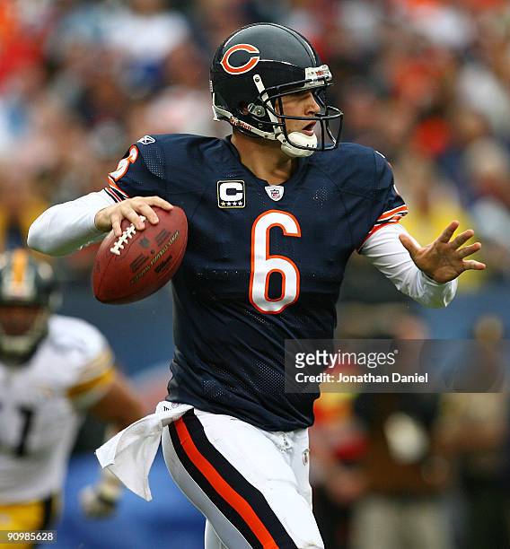 Jay Cutler of the Chicago Bears rolls out to look for a receiver against the Pittsburgh Steelers at Soldier Field on September 20, 2009 in Chicago,...
