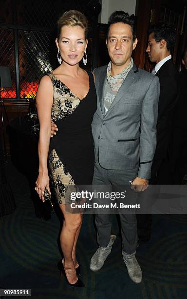 Kate Moss and Jamie Hince attend the Unique private dinner, at the IVY on September 20, 2009 in London, England.