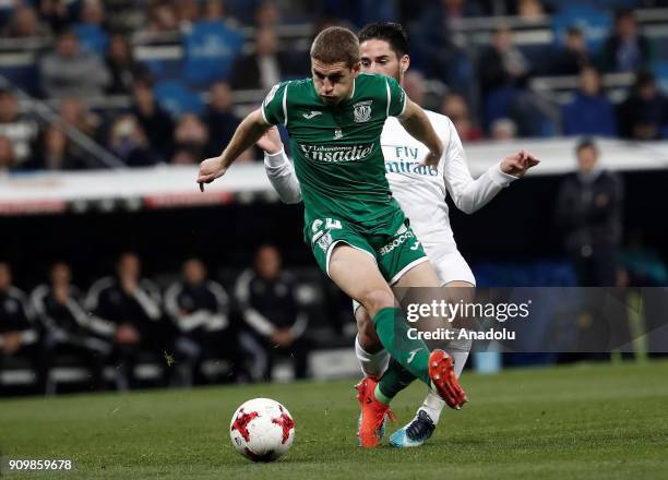 Isco Alarcon of Real Madrid in action against Darko Brasanac of Leganes during the Copa del Rey quarter final match between Real Madrid and Leganes...