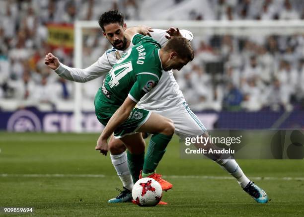 Isco Alarcon of Real Madrid in action against Darko Brasanac of Leganes during the Copa del Rey quarter final match between Real Madrid and Leganes...