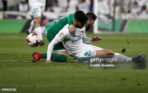 Marco Asensio of Real Madrid in action against Darko Brasanac of Leganes during the Copa del Rey quarter final match between Real Madrid and Leganes...