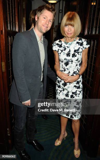 Christopher Bailey and Anna Wintour attend the Unique private dinner, at the IVY on September 20, 2009 in London, England.