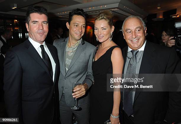 Simon Cowell, Jamie Hince, Kate Moss and Sir Philip Green attend the Unique private dinner, at the IVY on September 20, 2009 in London, England.