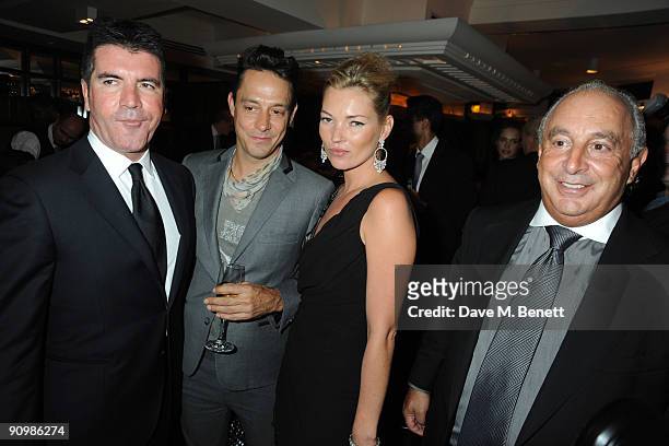 Simon Cowell, Jamie Hince, Kate Moss and Sir Philip Green attend the Unique private dinner, at the IVY on September 20, 2009 in London, England.