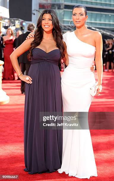 Personalities Kourtney Kardashian and Kim Kardashian arrives at the 61st Primetime Emmy Awards held at the Nokia Theatre on September 20, 2009 in Los...