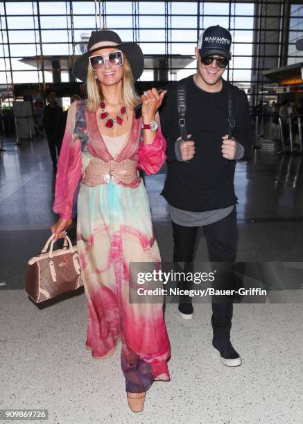 Paris Hilton and her fiance Chris Zylka seen on January 24, 2018 in Los Angeles, California.