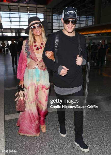 Paris Hilton and her fiance Chris Zylka seen on January 24, 2018 in Los Angeles, California.