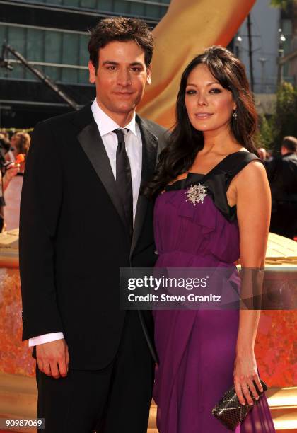 Actors Lindsay Price and Josh Radnor arrive at the 61st Primetime Emmy Awards held at the Nokia Theatre on September 20, 2009 in Los Angeles,...