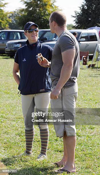 Zara Phillips and Mike Tindall chat together during the Gatcombe Horse Trials Three Day Event on September 20, 2009 in Minchinhampton, England.