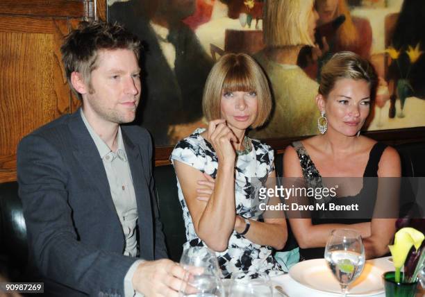 Christopher Bailey, Anna Wintour and Kate Moss attend the Unique private dinner, at the IVY on September 20, 2009 in London, England.
