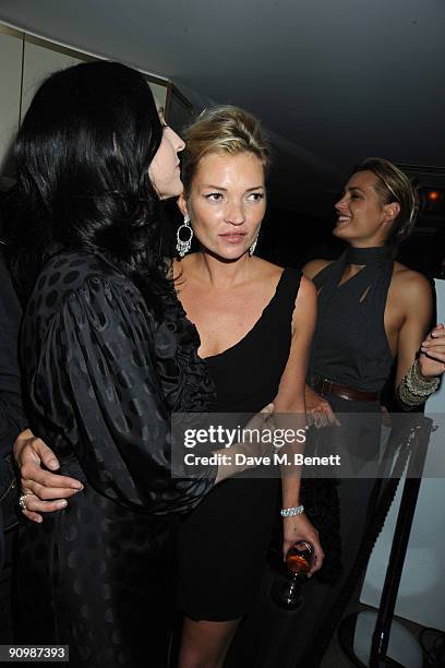 Susie Bick, Kate Moss and Yasmin Le Bon attend the Unique private dinner, at the IVY on September 20, 2009 in London, England.