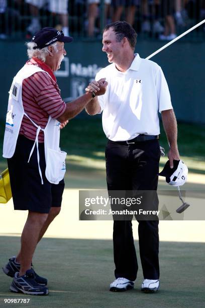 Fran Quinn is congratulated by his caddie after winning the Albertson's Boise Open at Hillcrest Country Club on September 20, 2009 in Boise, Idaho.