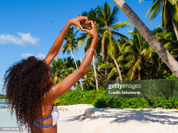 i love saona island! - antilles stock pictures, royalty-free photos & images