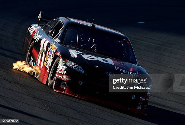 Denny Hamlin, driver of the FedEx Freight Toyota, drives during the NASCAR Sprint Cup Series Sylvania 300 at the New Hampshire Motor Speedway on...